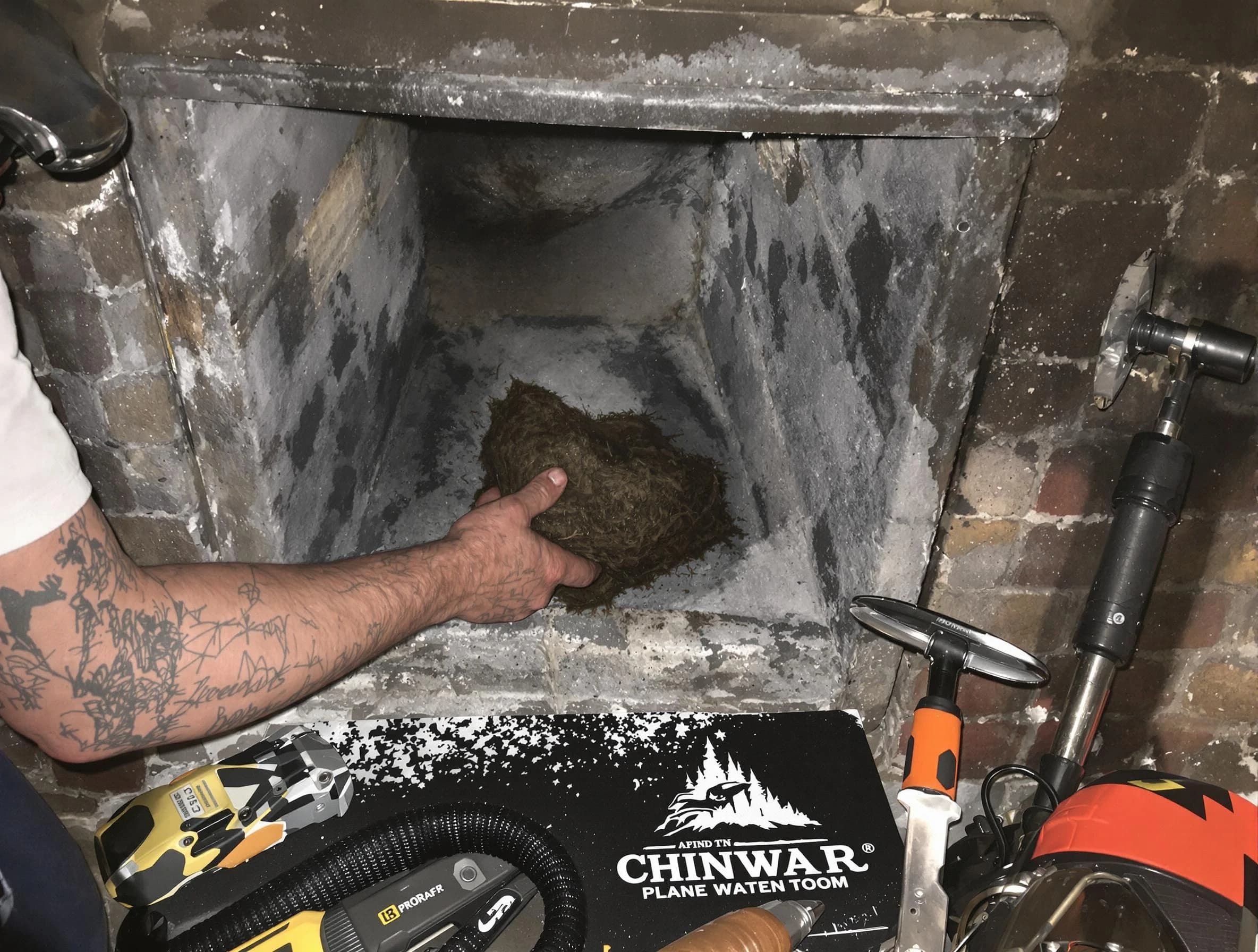 Sandy Chimney Sweep safely removing debris and screening chimney in Sandy, UT